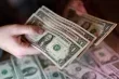 الدولار يستقر قرب أدنى مستوى في 10 أيام وسط تفاؤل باتفاق أمريكي إيراني