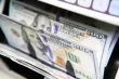 الدولار يلامس ادنى مستوياته وسط تحركات امريكية لضبط سوق السندات
