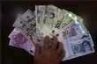 اقتصاد الحرب في ايران كيف يواجه الريال ضغوط العقوبات الدولية