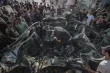 صورة مؤلمة ليد ممتدة من وسط النيران توثق لحظات استشهاد شاب في غزة